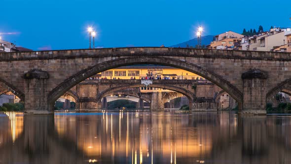 Twilight Sky Scene of Ponte Alla Carraia and Santa Trinita Holy Trinity Bridge Day To Night