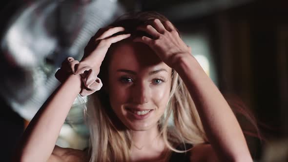 Portrait Of Confident Young Woman In Gym