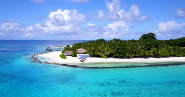 Luxury flying travel shot of a white paradise beach and turquoise sea background in best quality