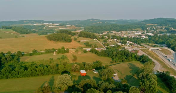 Pennsylvania USA Aerial View of a Small Town Village Surrounded By Trees and Hills