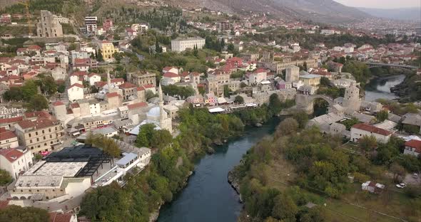 Aerial shot of Mostar in Bosnia and Herzegovina, wide shot of Mostar old town with the river Neretva