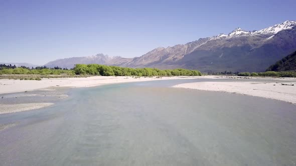 Flying along glacial river