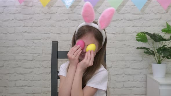 Portrait Easter Kid with Colorful Eggs