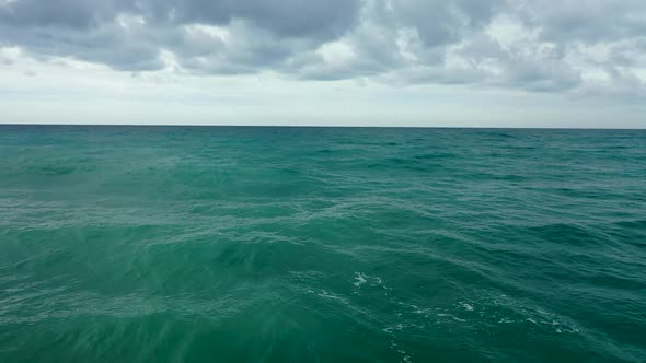 Storm at Sea Filmed on a Drone in the Sunset