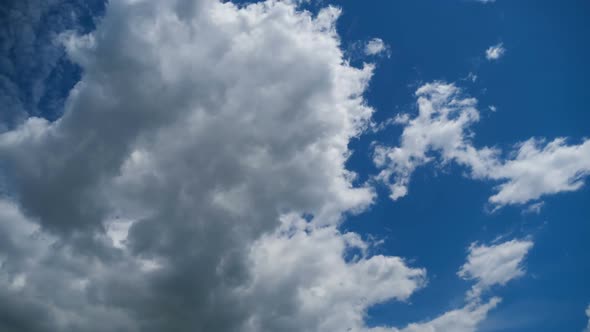 Clouds Move Smoothly in the Blue Sky. Timelapse