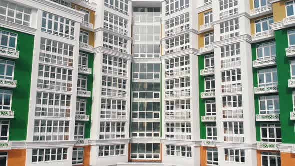 Renovated Multi-storey Building of Green White Colors Aerial