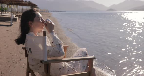 Portrait of Woman on Beach Enjoying Sunrise on Over Sea Luxury Vacation Travel On Turkey, Asia