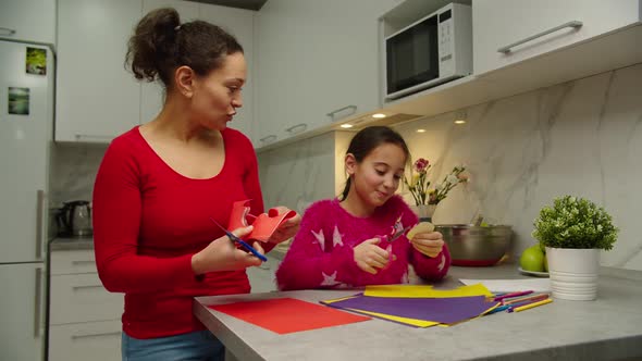 Mother Developing Creativity Talents Hobby of Young Daughter Indoors