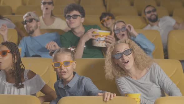 Happy Children and Adults in 3d Glasses Watching Film in Cinema. Portrait of Cheerful Kids, Men and