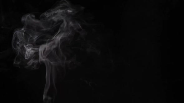 Soft Fog in Slow Motion on Dark Backdrop. Realistic Atmospheric White Smoke. 50 FPS