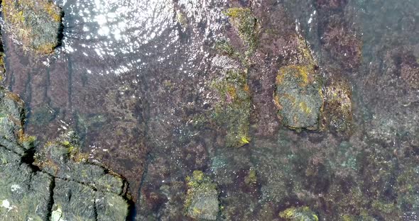 Shoreline rising drone shot of an intertidal zone taken by drone in 4k.  Shot was taken in Rhode Isl