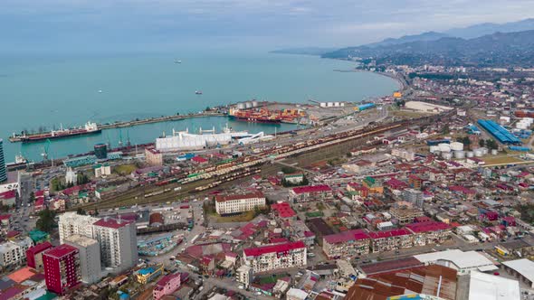 Aerial hyperlapse of International Marine Station pier in Batumi city. Black Sea harbor and bay