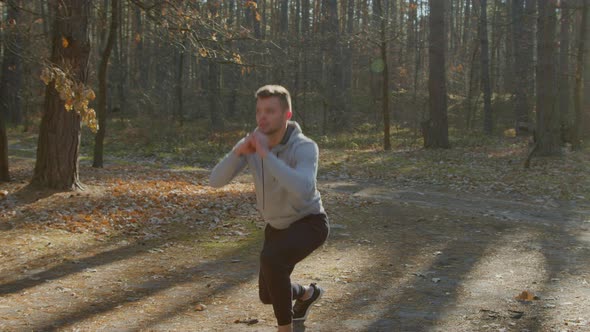 Man Is Doing Forward Lunges with Jumps