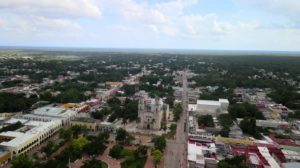 Aerial orbital view of sunset in valladolid main plaza in Yucatan Mexico