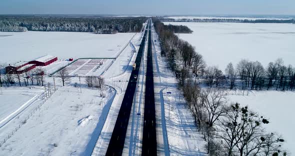 Aerial View of the Snow Road in Winter