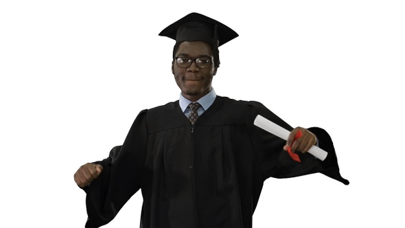 Young african amerian man walking and using phone on white