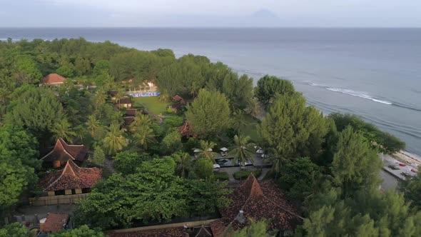 Aerial view of swimming pool in luxury resort, Gili Trawangan island, Indonesia.