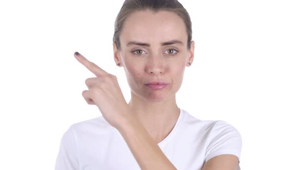 Woman Pointing at Side White Background