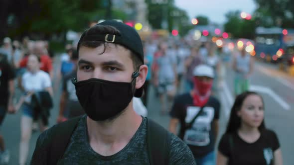 Picket Demonstration Against Pandemic Restrictions People in Face Mask Marching