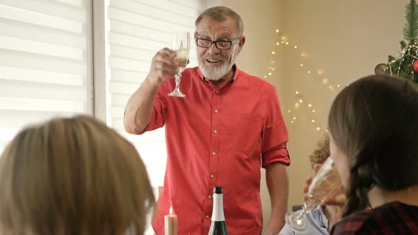 Happy Family Celebrating Christmas Together. Traditional Festive Christmas Dinner in