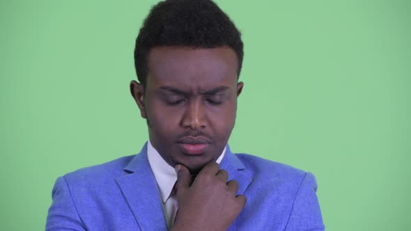 Face of Stressed Young African Businessman Thinking