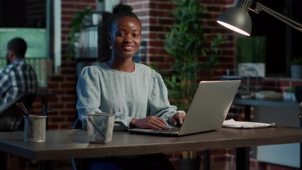 Portrait of African American Woman Working with Stock Exchange