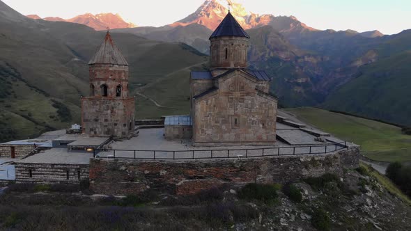 Aerial View At The Gergeti Trinity Church Tsminda Sameba