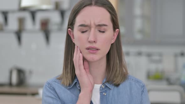 Portrait of Attractive Young Woman Having Toothache