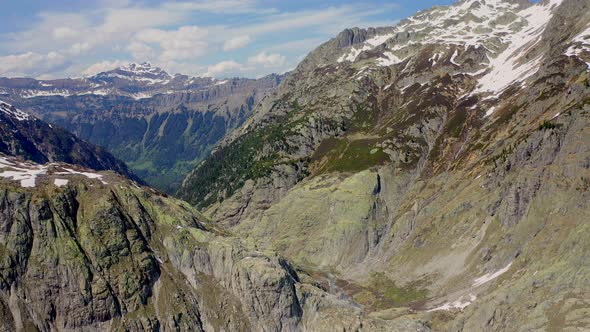 Aerial wide shot of breathtaking mountain panorama during very nice weather in Switzerland