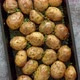 Oven Baked Whole Potatoes with Seasoning and Herbs in Metalic Tray - VideoHive Item for Sale