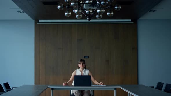 Successful Ceo Looking Computer in Conference Hall