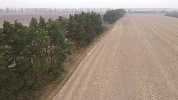 Empty Plowed Field in Autumn Aerial View