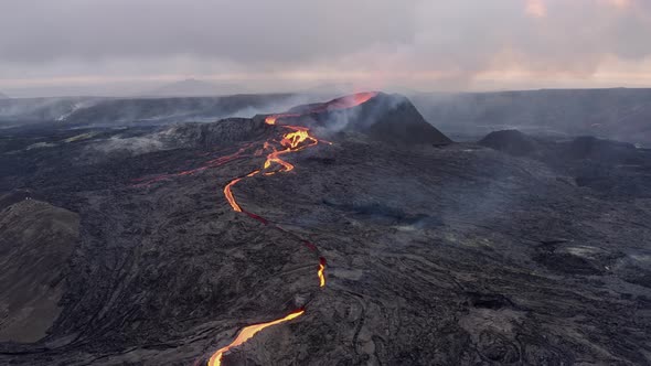 Panorama Of A Golden Lava River Flowing Down The Volcano. aerial