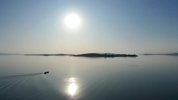 Fishing boat on lake at sunset golyazi, bursa turkey