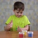 Cute Little Boy Shapes From Plasticine on the Table - VideoHive Item for Sale