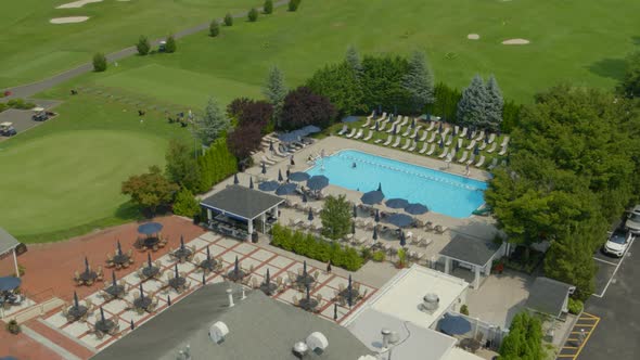 Rising Aerial View of Engineers Country Club Pool in Roslyn Long Island