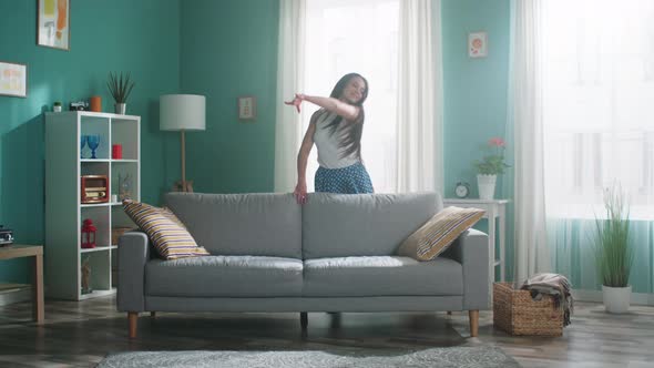 Woman Is Dancing In Apartment