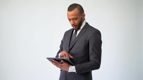 Professional African-american Business Man Holding Tablet PC