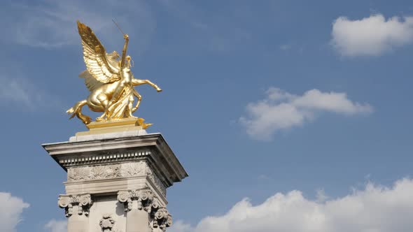 Detailed columns and sculptures of Pont Alexandre III bridge 4K 2160p 30fps UltraHD footage - Golden