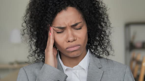 Headache, Stressed African Businesswoman with Pain in Head