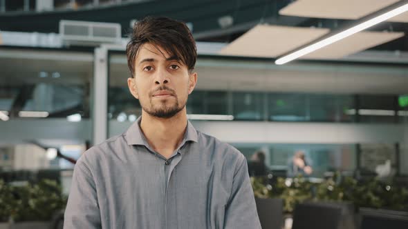 Confident Male Indian Man Arab Young Businessman Worker Stand in Office with Crossed Arms Handsome