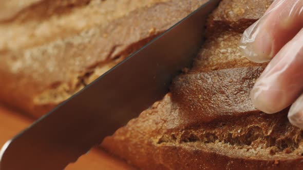 Macro shot Knife cuts delicious bread