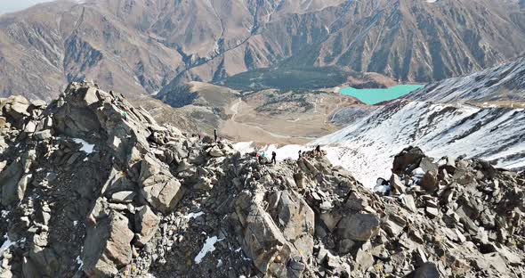 Top View of a Group of Tourists on a Peak