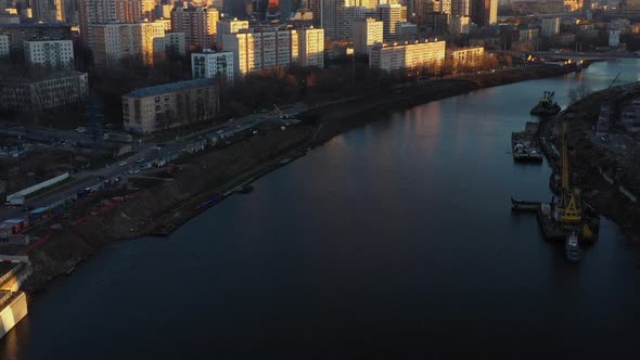 Flying Over the River with a View of Business Center Moscow City in Late Autumn