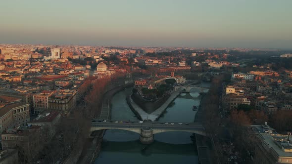 Panning right along Isola Tiberina on River Tiber in Rome alt