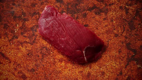 Piece of Raw Fresh Beef Steak Placed on Rusty Background