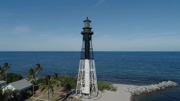 Aerial Point of Interest Around Coastal Inlet Lighthouse in South Florida  // Drone