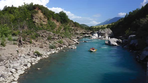 Rafting in clear blue water of Vjosa river, Albania. Summer adventures, extreme sports
