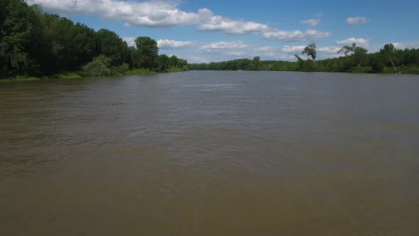 Flying Low Above Muddy River