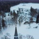Aerial Top View of the Krimulda Evangelic Lutheran Church in Winter at Sunrise Latvia 4k Video - VideoHive Item for Sale